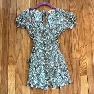 Floral dress with adjustable sides